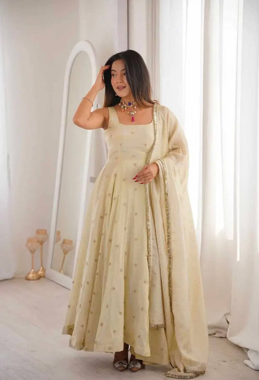 Beautiful Beige Color Cosmos Gold Embroidery Work Gown